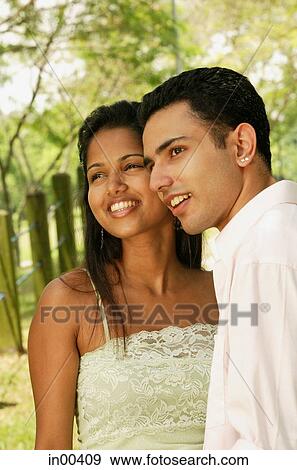 Couple standing cheek to cheek, portrait View Large Photo Image Stock Photo - Couple standing cheek to cheek, portrait. Fotosearch