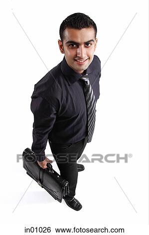 Executive carrying briefcase View Large Photo Image Stock Photograph - Executive carrying briefcase. Fotosearch