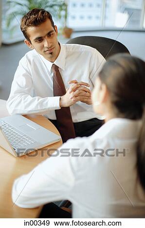 Executives having a meeting, man with hands clasped View Large Photo Image Stock Photo - Executives having a meeting, man with hands clasped. Fotosearch
