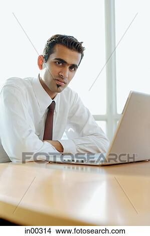 Male executive looking at camera, portrait View Large Photo Image Picture - Male executive looking at camera, portrait. Fotosearch