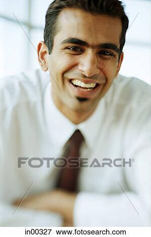 Male executive, smiling View Large Photo Image Stock Photo - Male executive, smiling. Fotosearch