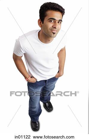 Man looking at camera, hands in pocket View Large Photo Image Stock Image - Man looking at camera, hands in pocket. Fotosearch