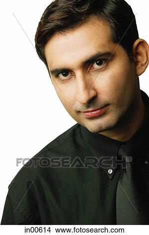 Picture - Man looking at camera, portrait. Fotosearch