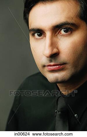 Man looking at camera, portrait View Large Photo Image Picture - Man looking at camera, portrait. Fotosearch