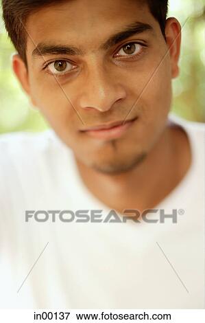 Man looking at camera, portrait View Large Photo Image Stock Photo - Man looking at camera, portrait. Fotosearch