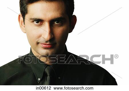 Stock Image - Man looking at camera. Fotosearch