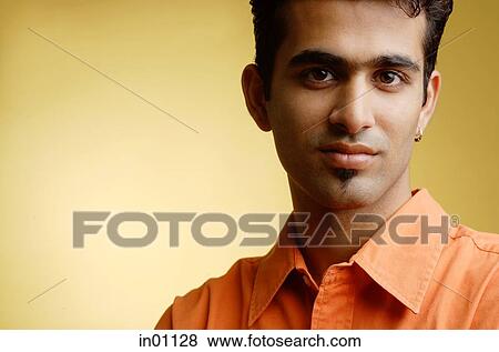 Stock Photo - Man looking at camera. Fotosearch