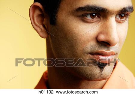 Man looking away, head shot View Large Photo Image Stock Image - Man looking away, head shot. Fotosearch