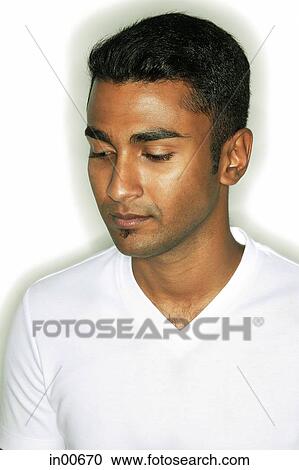Man looking down View Large Photo Image Stock Image - Man looking down. Fotosearch