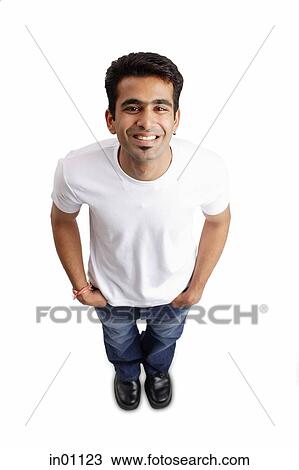 Man smiling at camera, hands in pocket View Large Photo Image Stock Image - Man smiling at camera, hands in pocket. Fotosearch