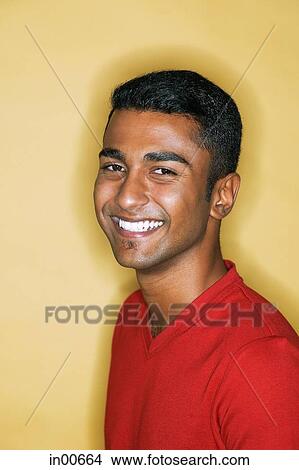 Man smiling at camera, portrait View Large Photo Image Picture - Man smiling at camera, portrait. Fotosearch