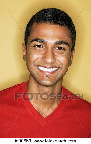 Stock Image - Man smiling at camera. Fotosearch