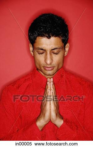 Man with eyes closed, hands up, palms together View Large Photo Image Stock Photography - Man with eyes closed, hands up, palms together. Fotosearch