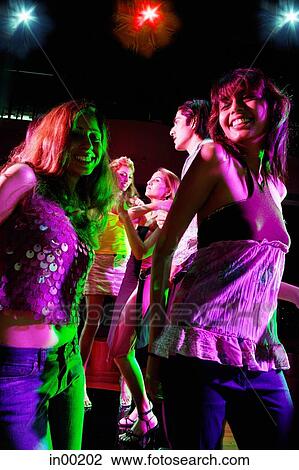People dancing in night club View Large Photo Image Stock Image - People dancing in night club. Fotosearch