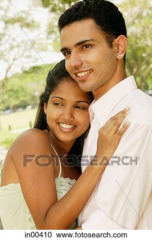 Portrait of a couple, woman leaning on man's chest View Large Photo Image Stock Image - Portrait of a couple, woman leaning on man's chest. Fotosearch