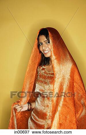 Woman in Indian clothing, scarf draped on head View Large Photo Image Stock Photo - Woman in Indian clothing, scarf draped on head. Fotosearch
