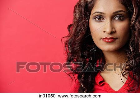 Woman looking at camera, portrait View Large Photo Image Stock Image - Woman looking at camera, portrait. Fotosearch