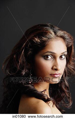 Woman looking at camera, portrait View Large Photo Image Stock Image - Woman looking at camera, portrait. Fotosearch