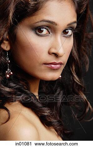 Woman looking at camera, portrait View Large Photo Image Stock Image - Woman looking at camera, portrait. Fotosearch