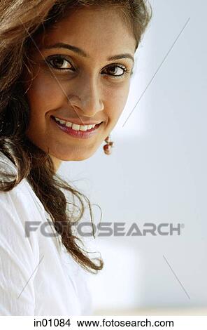 Picture - Woman smiling at camera, head shot. Fotosearch