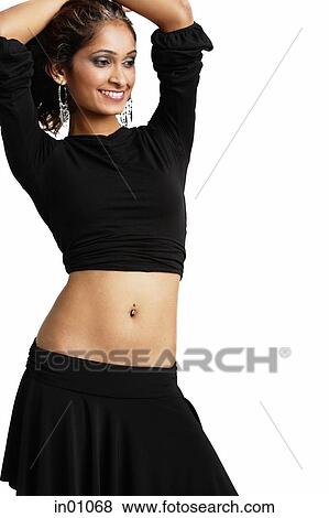 Woman standing with hands on head, looking away View Large Photo Image Stock Photo - Woman standing with hands on head, looking away. Fotosearch