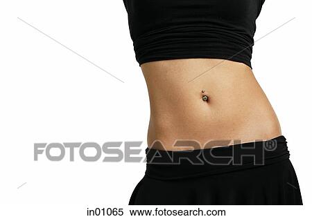 Woman with belly ring View Large Photo Image Stock Photography - Woman with belly ring. Fotosearch