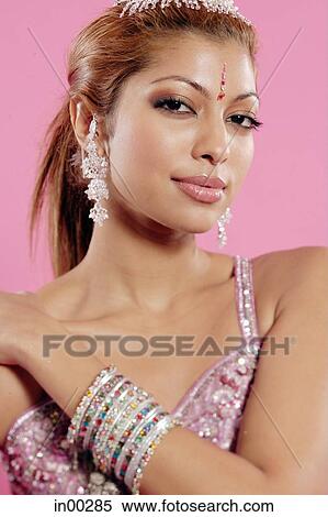 Young woman in Indian costume, looking at camera View Large Photo Image Stock Photography - Young woman in Indian costume, looking at camera. Fotosearch