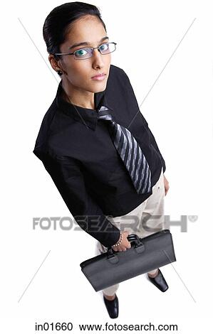 Business woman looking up at camera, high angle view View Large Photo Image Stock Image - Business woman looking up at camera, high angle view. Fotosearch