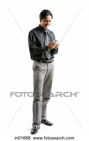 Stock Photo - Businessman using PDA. Fotosearch