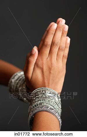 Close-up of woman's hands together in prayer position View Large Photo Image Stock Image - Close-up of woman's hands together in prayer position. Fotosearch