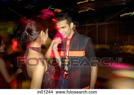 Couple dancing in night club View Large Photo Image Picture - Couple dancing in night club. Fotosearch