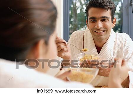 Couple having breakfast View Large Photo Image Stock Photo - Couple having breakfast. Fotosearch