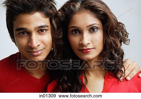 Couple looking at camera View Large Photo Image Stock Photo - Couple looking at camera. Fotosearch
