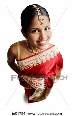 Woman in sari smiling at camera View Large Photo Image Picture - Woman in sari smiling at camera. Fotosearch