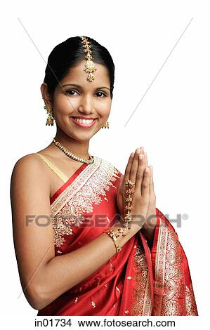Picture - Woman in traditional Indian costume, smiling at camera. Fotosearch