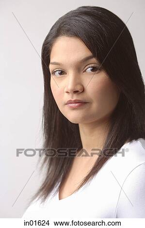 Picture - Woman looking at camera. Fotosearch