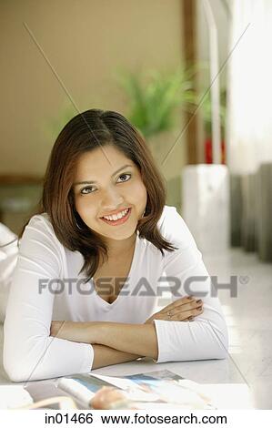 Woman looking at camera, portrait View Large Photo Image Stock Photograph - Woman looking at camera, portrait. Fotosearch