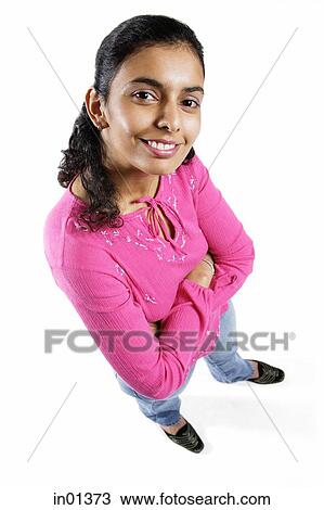 Woman looking up at camera, arms crossed View Large Photo Image Stock Image - Woman looking up at camera, arms crossed. Fotosearch