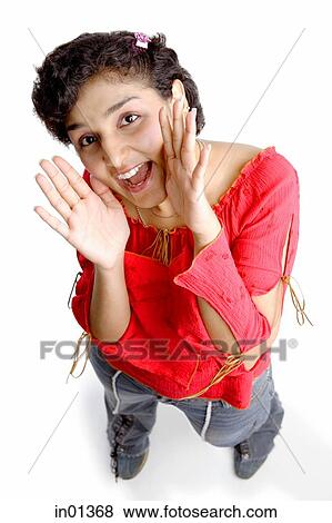 Woman shouting, looking up at camera View Large Photo Image Stock Photo - Woman shouting, looking up at camera. Fotosearch