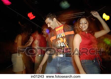 Stock Image - Young adults dancing. Fotosearch