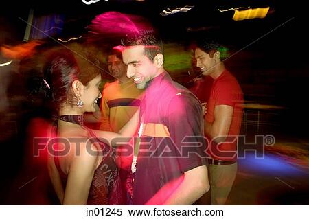 Young people dancing in night club View Large Photo Image Stock Photography - Young people dancing in night club. Fotosearch