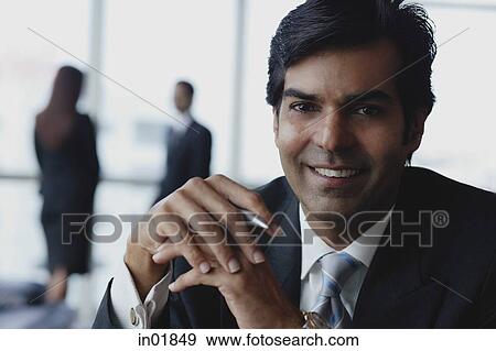 Businessman smiling at camera View Large Photo Image Stock Photo - Businessman smiling at camera. Fotosearch