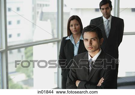 Businesspeople looking at camera View Large Photo Image Picture - Businesspeople looking at camera. Fotosearch