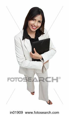 Businesswoman looking up at camera View Large Photo Image Stock Photo - Businesswoman looking up at camera. Fotosearch