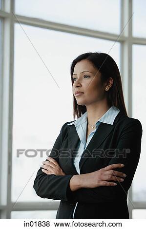 Businesswoman with arms crossed View Large Photo Image Stock Photo - Businesswoman with arms crossed. Fotosearch