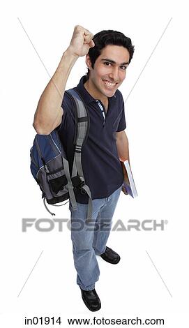 College student looking at camera, raising a fist, smiling View Large Photo Image Picture - College student looking at camera, raising a fist, smiling. Fotosearch