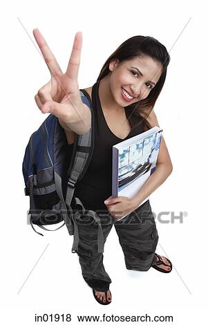 Female college student, high angle view, making hand sign View Large Photo Image Stock Photo - Female college student, high angle view, making hand sign. Fotosearch