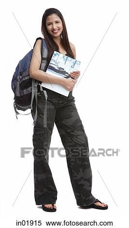 Female college student looking at camera, smiling View Large Photo Image Stock Photography - Female college student looking at camera, smiling. Fotosearch