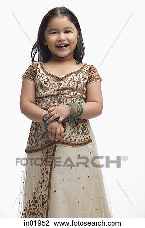 Stock Image - Young girl in traditional Indian clothing. Fotosearch