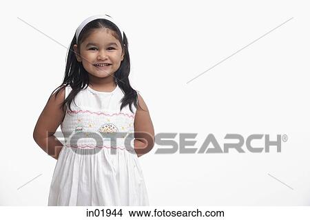 Young girl in white dress View Large Photo Image Picture - Young girl in white dress. Fotosearch